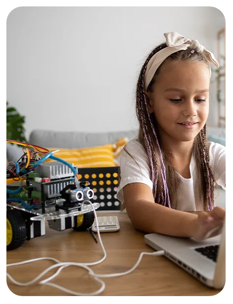 Alunos Zuhri aprendendo robótica educacional